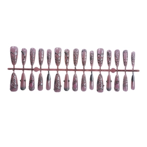 3D cat-eye silver press-on nails in long almond shape with elegant pink and metal accents