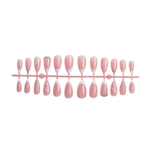 Almond French tip press-on nails with white borders, rhinestones and marble patterns