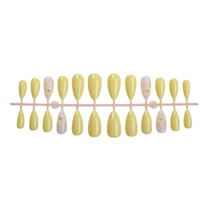 Yellow almond press-on nails with 3D white flower accents and glossy finish for women