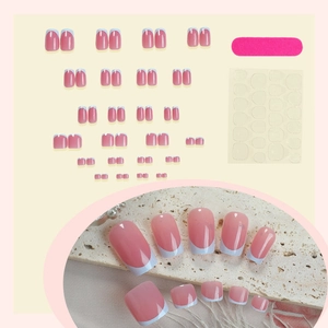 Pink French style press-on toe nail kit with white tips, nail file and adhesive tabs