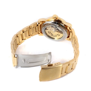 Exhibition caseback showing automatic movement of the gold stainless steel watch