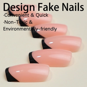 Glossy nude pink press-on nails with black V-shaped French tips set on beige background