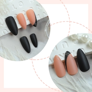 Matte almond press-on nails with black and nude pink French style and silver glitter lines
