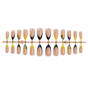 Faux ongles amande French avec bord jaune et motifs de fleurs et feuilles 24 pièces