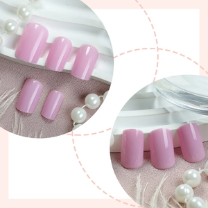 Glossy light pink short square press-on nails with minimalist French style