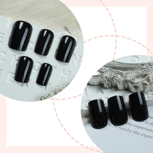 Glossy black minimalist short square press-on nails set with high-shine mirror finish