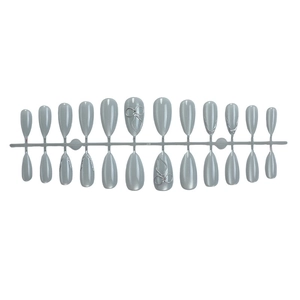Silver-grey cat eye press-on nails set with 3D metallic bow designs on white background