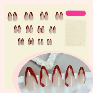 Almond fake nails with red French tips and gold wavy lines, 24 pieces with tool kit