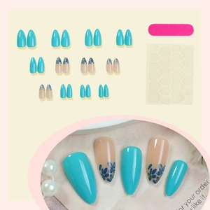 Blue french almond press-on nails set with floral art and gold glitter accents