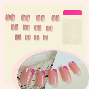 Pink French press-on nails with irregular purple tips, silver glitter, and 24-piece kit