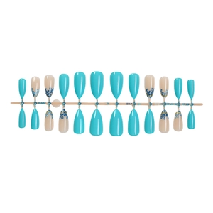French blue floral almond press-on nails set with gold accents on white background