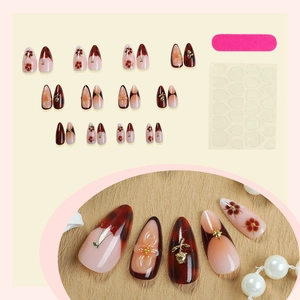 3D floral and cherry press-on nail kit with pink gradient and gold 3D ornaments