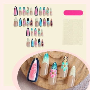 Long almond press-on nails with 3D floral designs, gradient patterns and manicure kit