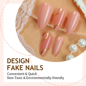 French nude almond press-on nails with floral gold foil design and high gloss finish