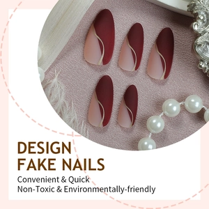 Almond matte press on nails with burgundy pink blocks and golden wavy line accents