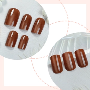 Brown cat-eye magnetic press-on nails with shimmering gradient and metallic finish