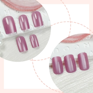 Pearlescent pink cat-eye press-on nails in square shape with shimmering metallic finish