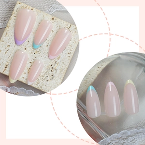 Almond-shaped French press-on nails set with colorful tips in pastel shades for women