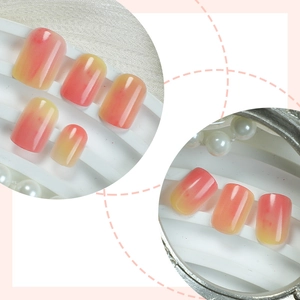 Faux ongles adhésifs avec dégradé rose et jaune et finition brillante