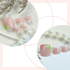 Fresh summer floral short press-on toenails with nude pink and green leaf designs