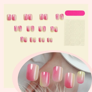 Short square gradient press-on nails in grape purple and yellow with full tool kit