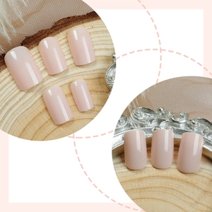 Glossy nude pink short square press-on nails set with elegant marble texture finish