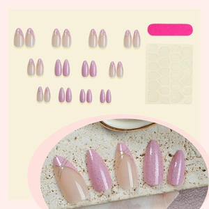 Elegant purple glitter press-on nails with French tip design and gold line details