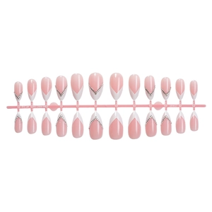French tip almond press-on nails with V-shape rhinestones on pink display stand