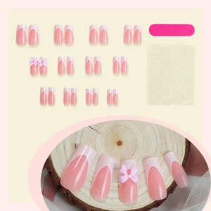Handmade nude french press-on nails set with 3D pink bows and full tool kit