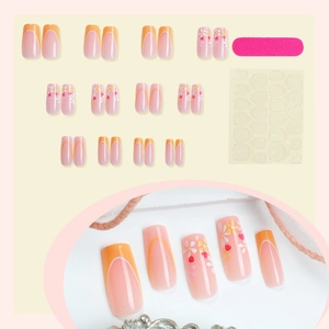 Floral press-on nail set with French tips, small flowers, and strawberry patterns for spring