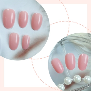 Short oval nude jelly pink press-on nails with glossy finish for summer minimalist style