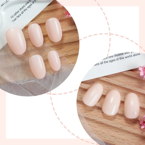 Minimalist nude pink marble oval press-on nails set with elegant glossy finish