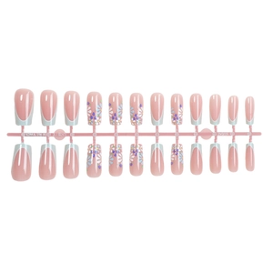 French press-on nails with blue and white floral patterns on long coffin shaped tips