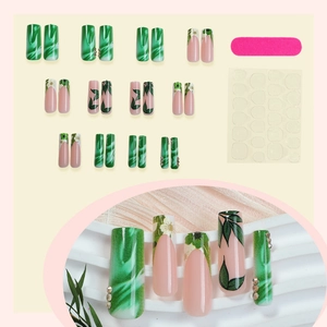 French gradient green marble press-on nails with leaf patterns and small white flowers