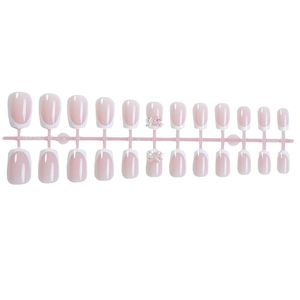 French tip press-on nails in nude pink with 3D bows and rhinestones, 24-piece set