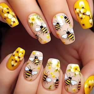 Cute yellow honeybee and floral press-on nails for summer with realistic hand-painted designs