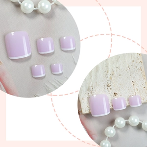 Short light purple French press-on toenails with glossy finish and white tips