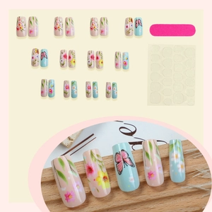 Floral press-on nail kit with light blue and pink flower designs, 24 piece set with file