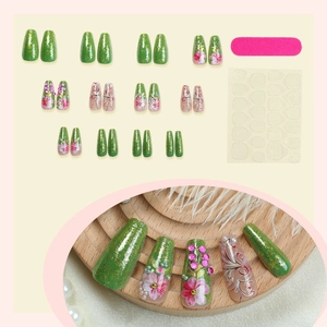 Green floral press-on nails with 24 long ballerina pieces, pearls and pink rhinestones