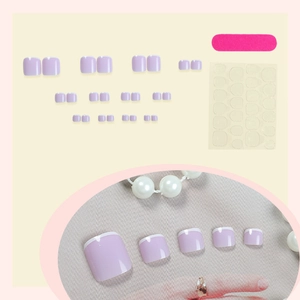 Lavender purple press-on toenails with white French tips, nail file and glue tabs set