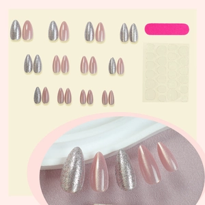 Sparkly almond cat eye press-on nail kit with silver glitter and pink nude finish