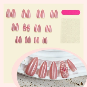 Glossy nude pink almond press-on nails set with 3D floral accents and 24pcs nail tips