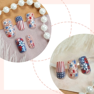 Colorful floral press-on nails with American flag designs for a stylish summer look