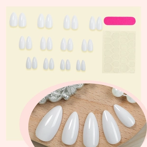 Glossy white marble almond press-on nails set with adhesive tabs and file tool