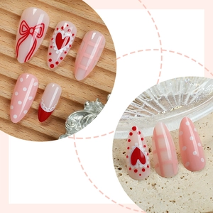 Sweet pink and red almond press-on nails with bow, heart, and plaid patterns