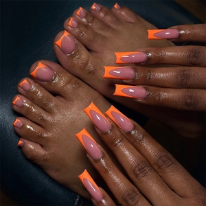 French style long square press-on nails in nude pink with bright orange tips set