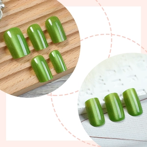 Short square vibrant green cat-eye press-on nails with magnetic gradient effect