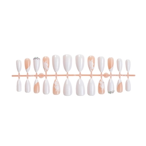Almond-shaped press-on nails with white floral art and rhinestones on pink rack