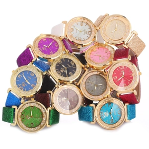 Orologi al quarzo con cinturino in pelle glitterata e lunette di strass in vari colori