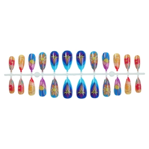 Almond shaped press-on nails with mixed floral patterns and golden star designs